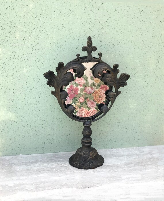 Gorgeous Castle style large ornate vanity mirror. 18” Hand wrought cast metal. Very heavy. Gothic decor.